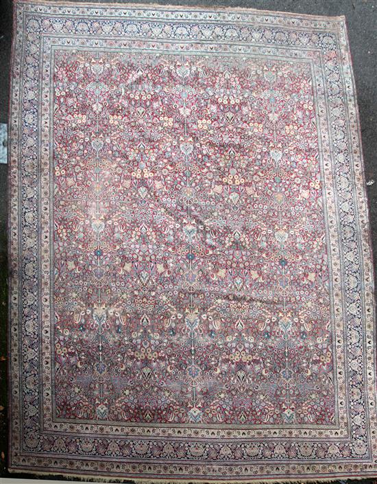 A Kirman carpet, 19ft x 15ft 6in.